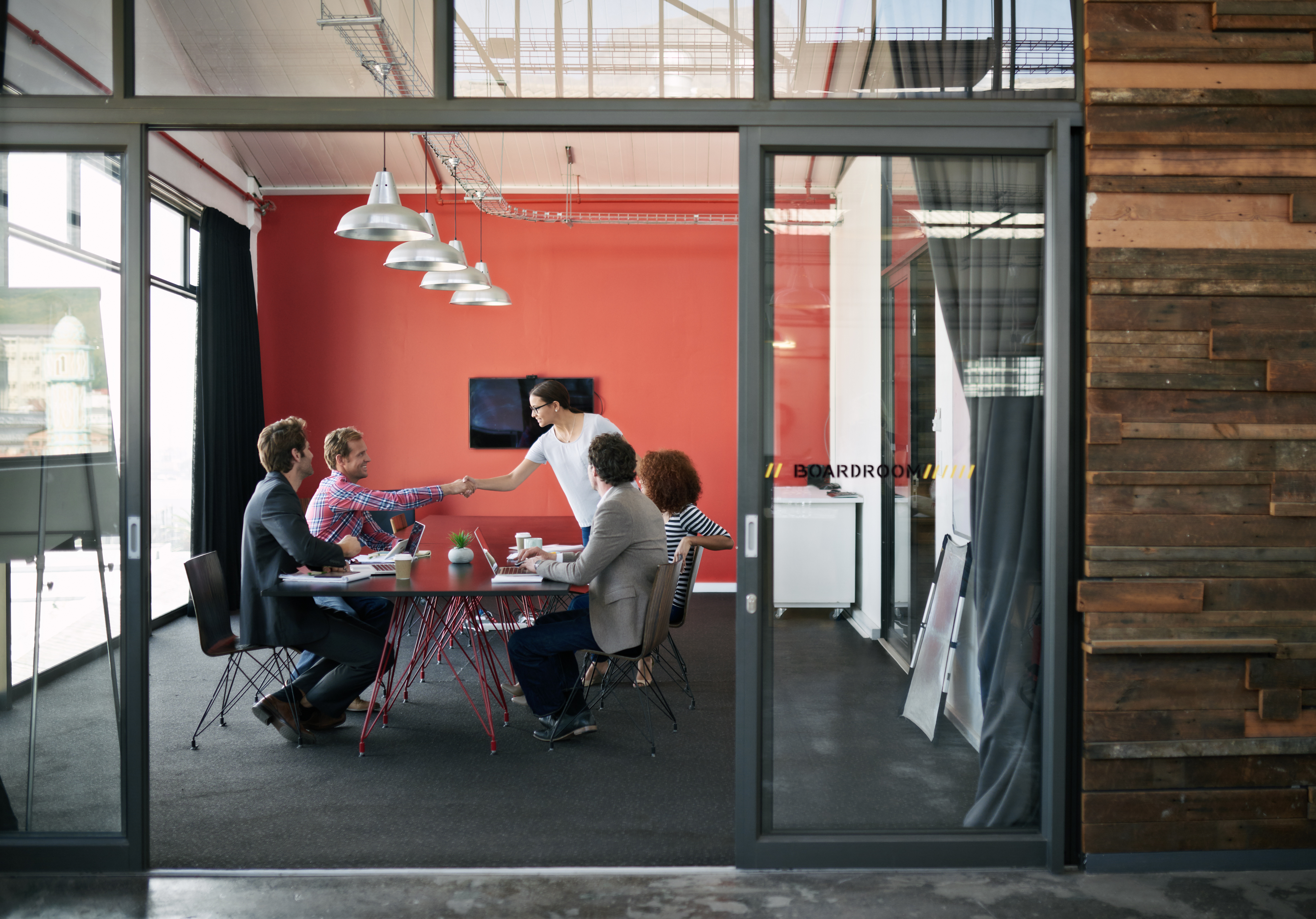 Shot of a group of colleagues having a meeting in a boardroom