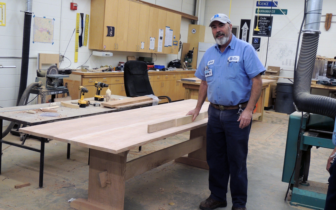Andy O'Shea built a table from a campus tree. The table was placed in Duke's Smart Home. Photo by Sarah Burdick.