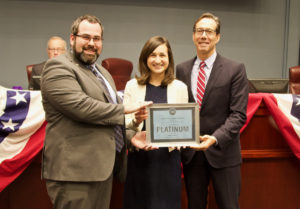 . From left to right, the individuals in the photo are: Mark Bryan, Director, U.S. Green Building Council National Capital Region; Katie Cristol, Vice Chair, Arlington County; Jay Fisette, Chair, Arlington County.