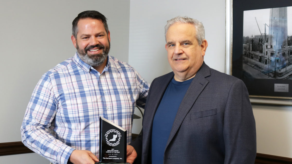 Two Garland leaders accepting ESOP award