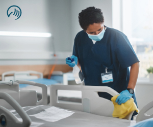 OpenWorks image showing FM employee cleaning a healthcare clinic