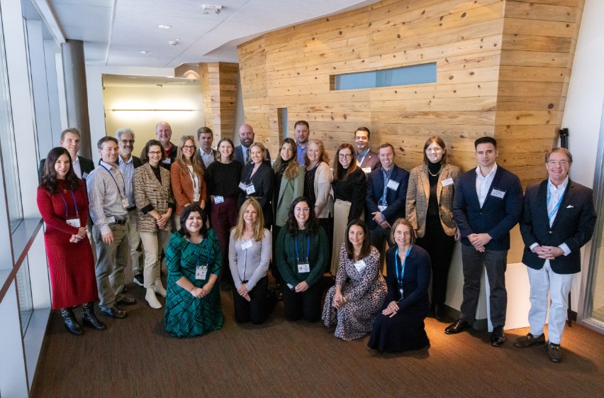 Attendees pose for a group photo at the Wells Fargo Innovation Incubator (IN²)