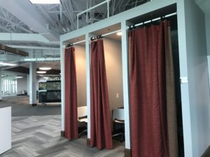 Need some quiet work time or visiting from another office? Just pull the curtain for instant office. Photo courtesy of Mohawk. 